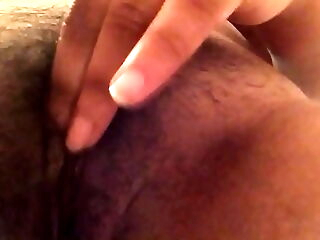 My Indian girlfriend playing around her firsthand pussy for me.